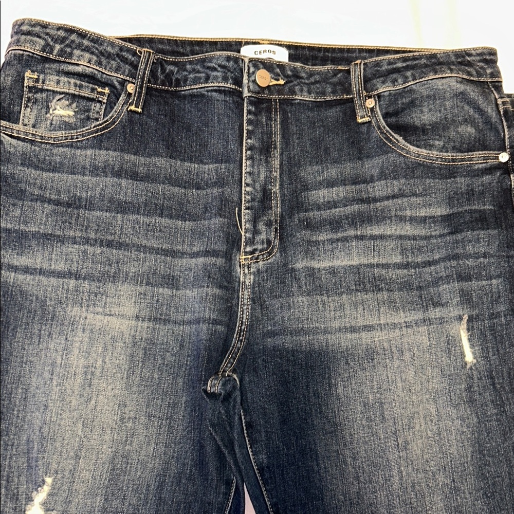 Ceros Women's Dark Blue Flare Jeans with small rips